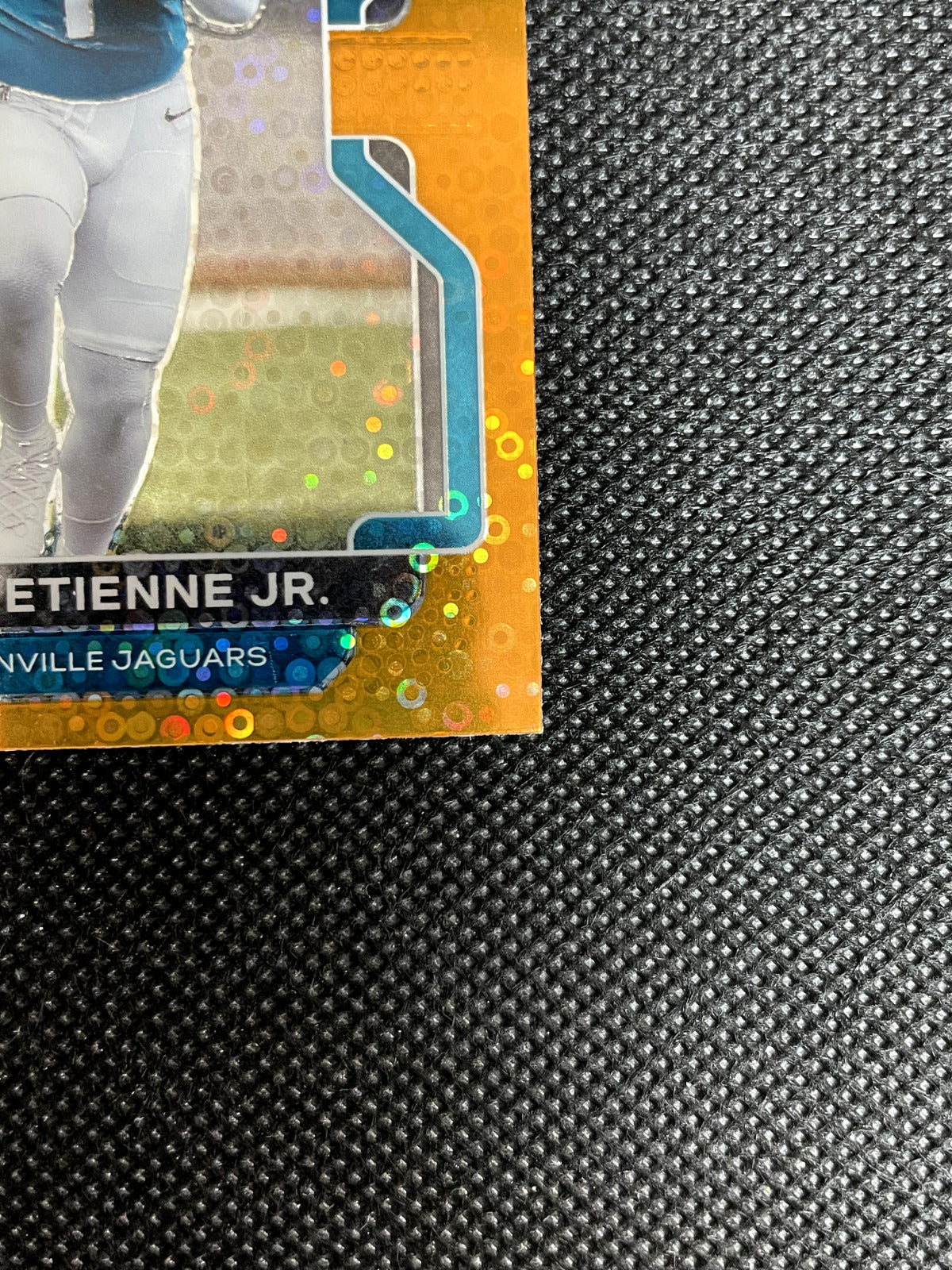 2021 Panini Prizm Travis Etienne Jr Orange Disco Prizm Rookie Jaguars